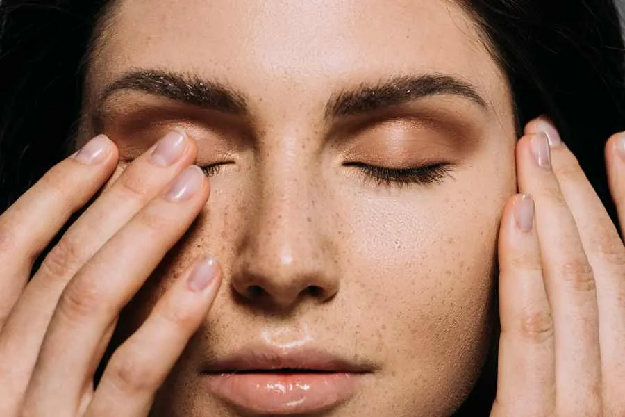 woman with hand over face